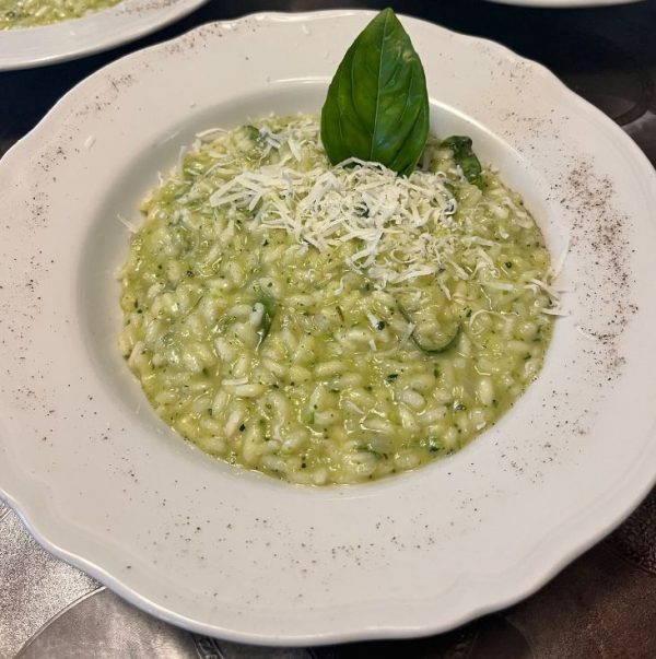 Creamy basil pesto risotto topped with parmesan