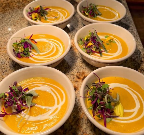 Velvety butternut squash soup with microgreens