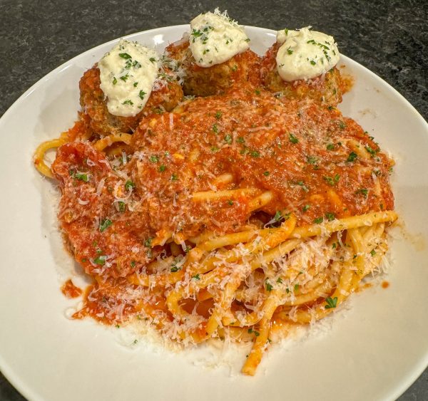 Spaghetti in tomato sauce with burrata made by a Los Angeles private chef