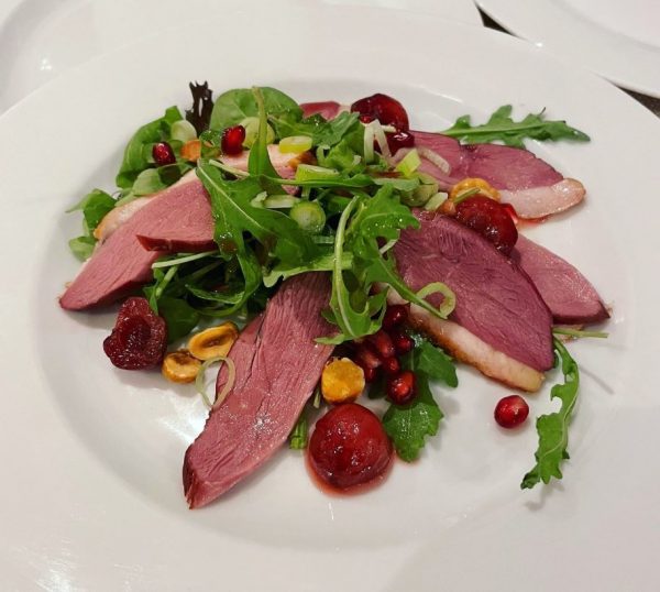 Fresh summer ham salad with seasonal greens