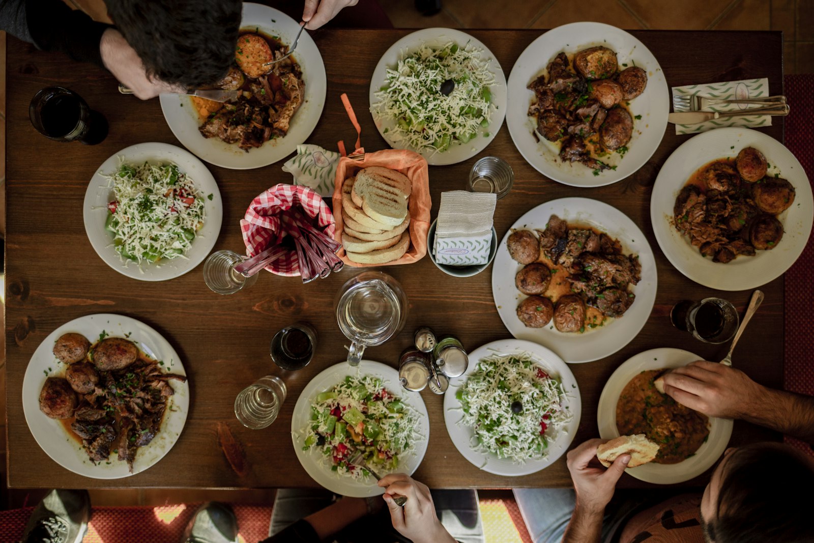 A holiday food spread of plated dishes on a table, catered by a private chef in Los Angeles