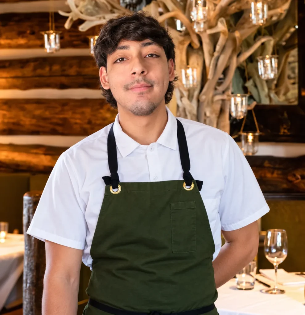 Private chef in a white chef shirt and green apron, The Private Chef Los Angeles
